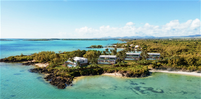 Discover a contemporary luxury villa with a foot in the water in the north of Mauritius 429674095